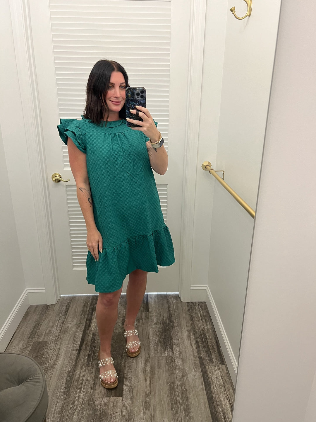 Textured Sleeveless Ruffle Dress