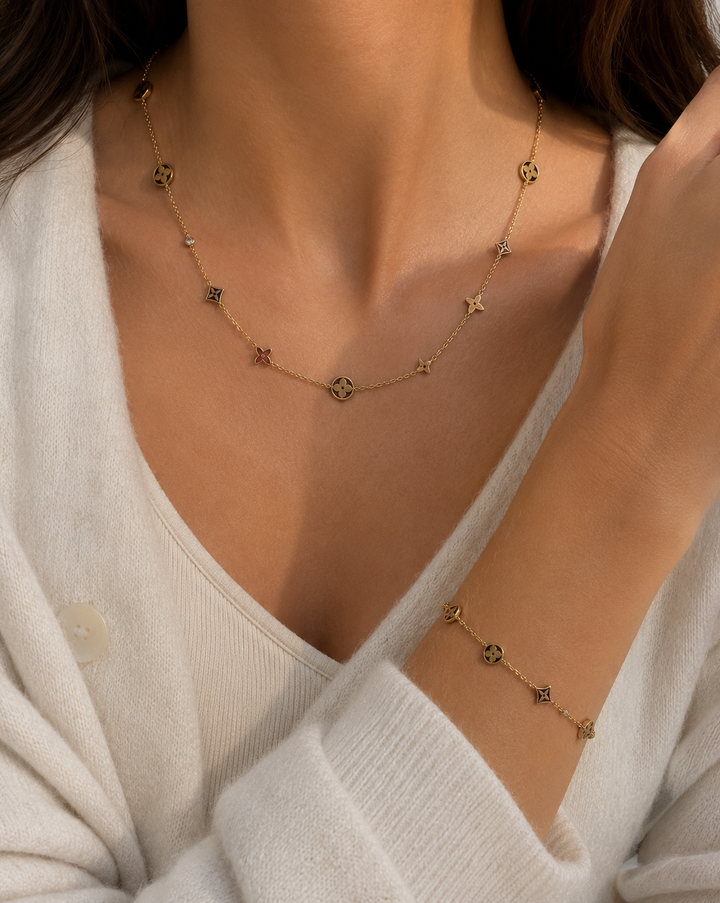 Gold Circle, Flower, and Stud Charm Bracelet
